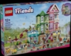 Slika LEGO® FRIENDS 42670 Stanovi i trgovine u Heartlakeu