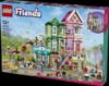 Slika LEGO® FRIENDS 42670 Stanovi i trgovine u Heartlakeu